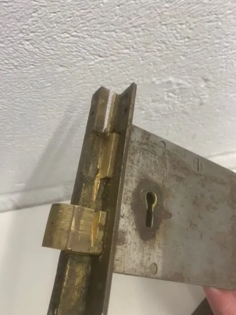 Damaged 1890 mortice lock from St Mary’s Church, Bishopstoke