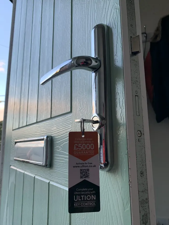 New lock fitted to a front door after a property purchase