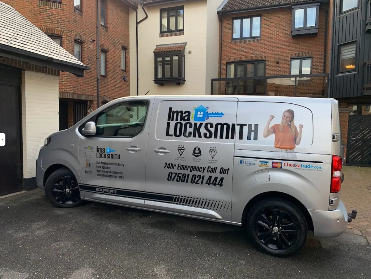The silver IMA Locksmith van parked on a Southampton street